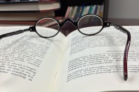 glasses on a book