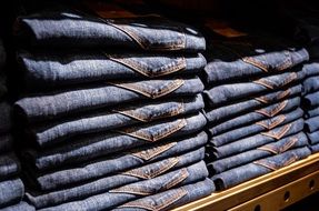 shelf with blue jeans