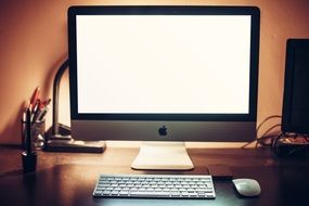 White monitor of imac in the office