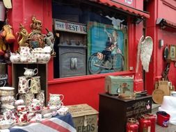 selling antique goods on a street in London