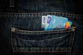 money and card in jeans