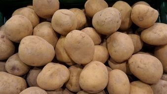 a lot of potatoes on the market for sale