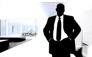 silhouette of businessman on the background of buildings