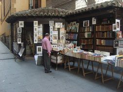 selling old books at a street fair