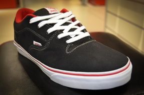 black sneakers with red details