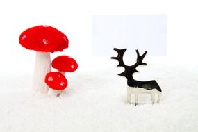 Metal mushrooms and metal deer Statues