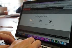 businessman works on laptop