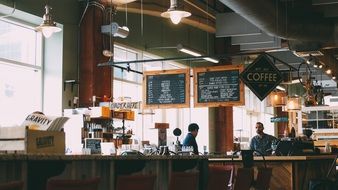 menu in the restaurant above the counter