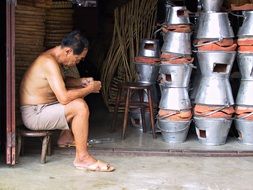 asian man sells burners in thailand