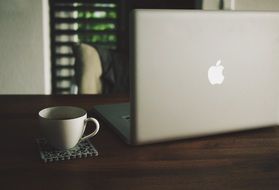 macbook apple laptop and coffee