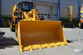 yellow bucket excavator