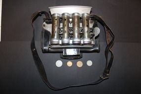 vintage money changer and coins