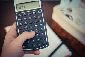 figures on a black calculator
