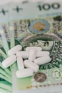 medications and money bills