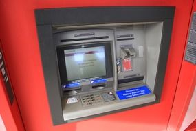 red automated teller machine