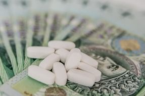 medication and money close-up