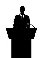 silhouette of a man behind the podium