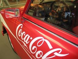 Coca Cola label on car door