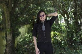 man in glasses with long hair
