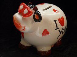ceramic piggy bank with hearts spots