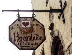 oldtime hanseatic league street sign at wall