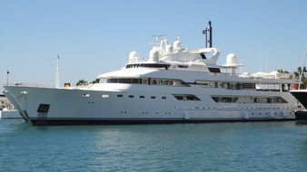 luxury white boat at dock