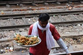 selling food at a train station in Chile