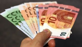 many different euro in hand