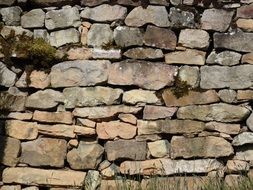 sunlit natural stone wall