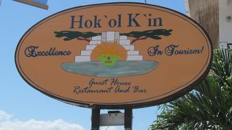 street sign of hotel at sky