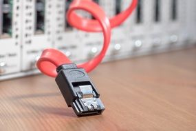 pink cable in server cabinet