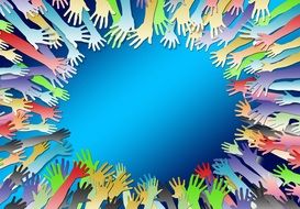 colored hands in a circle on a blue background