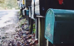 multi-colored mailboxes along the road