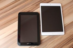 black and white tablets on the table