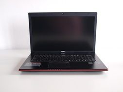 Photo of black and red laptop
