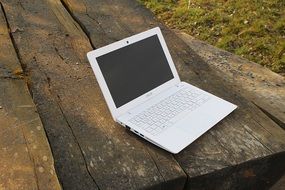 laptop on the wooden table