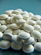 many white pills on the table