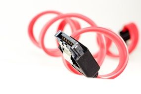 Plug with a twisted pink cable