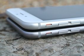 a side view of the two smartphones iPhone 6 color silver metallic