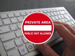 private area sign on keyboard background