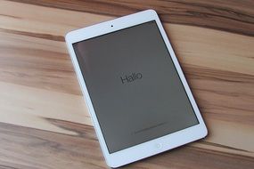 White iPad on a table