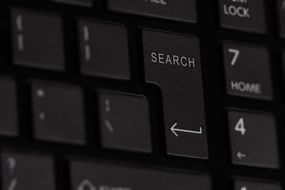 button search on a black keyboard