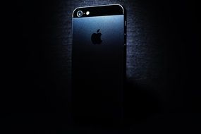 black iphone at dark background
