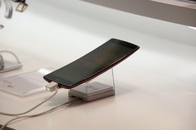 flexible smartphone on the counter in the store