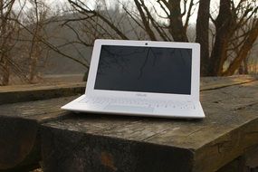 white laptop on the table