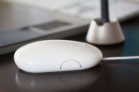 White computer mouse on the table