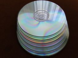 stack of cd and dvd disks