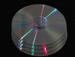 Computer disks on a black background