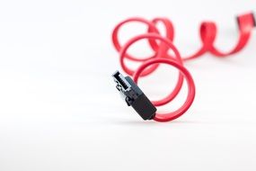 Red twisted cable with black plug