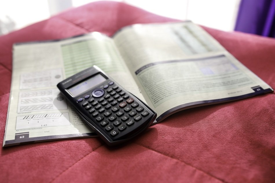 digital calculator on the sofa